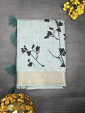 Dola silk fancy saree light blue color allover prints & zari border with printed pallu and printed blouse