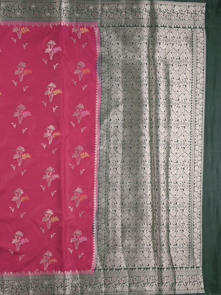 Raw mango fancy saree in pink color with allover zari motifs and zari border with brocade pallu & blouse