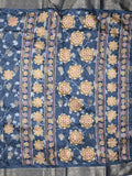 Dola silk fancy saree navy blue color allover prints & zari border with printed pallu and printed blouse