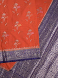 Raw mango fancy saree in orange color with allover zari motifs and zari border with brocade pallu & blouse