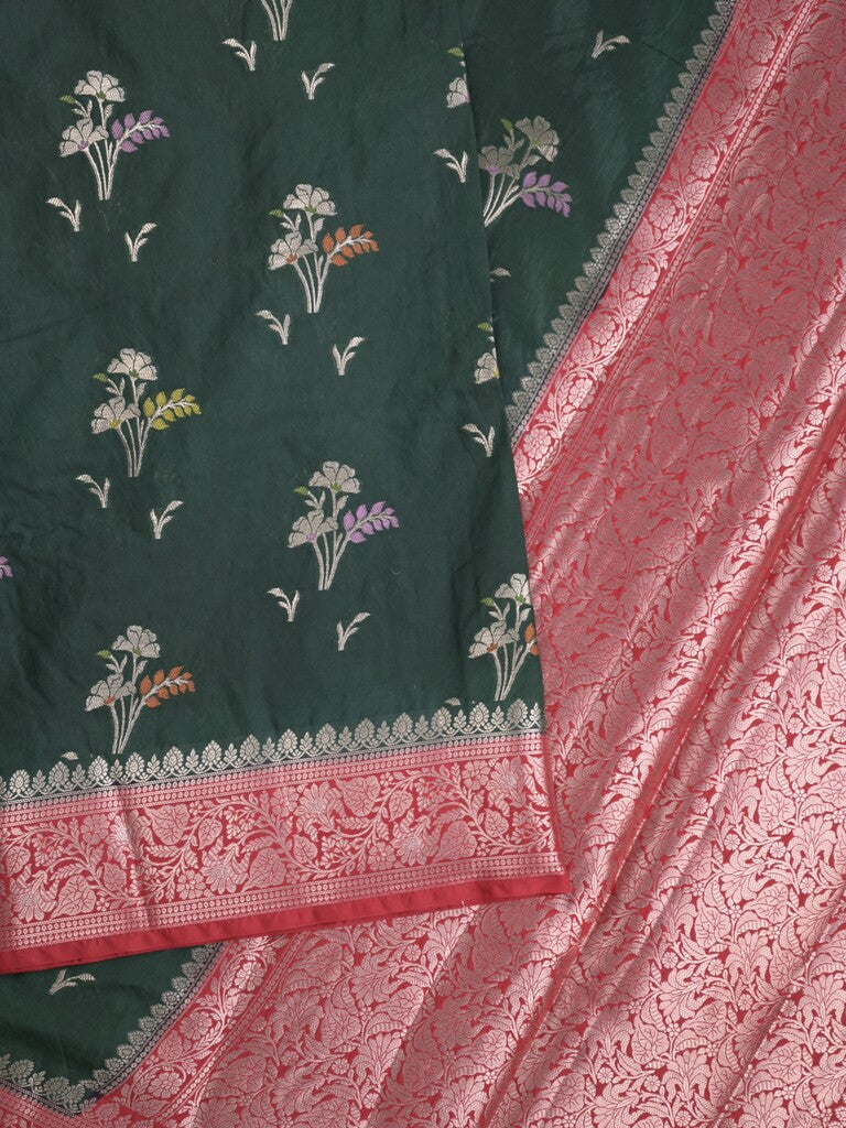 Raw mango fancy saree in dark green color with allover zari motifs and zari border with brocade pallu & blouse