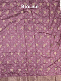 Dola silk fancy saree purple color allover prints & zari border with printed pallu and printed blouse