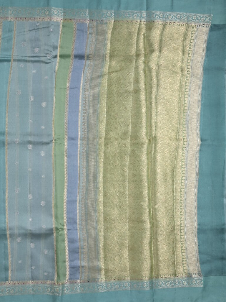 Raw mango fancy saree in light blue color with allover zari weaves and zari border with brocade pallu & blouse