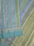 Raw mango fancy saree in light blue color with allover zari weaves and zari border with brocade pallu & blouse