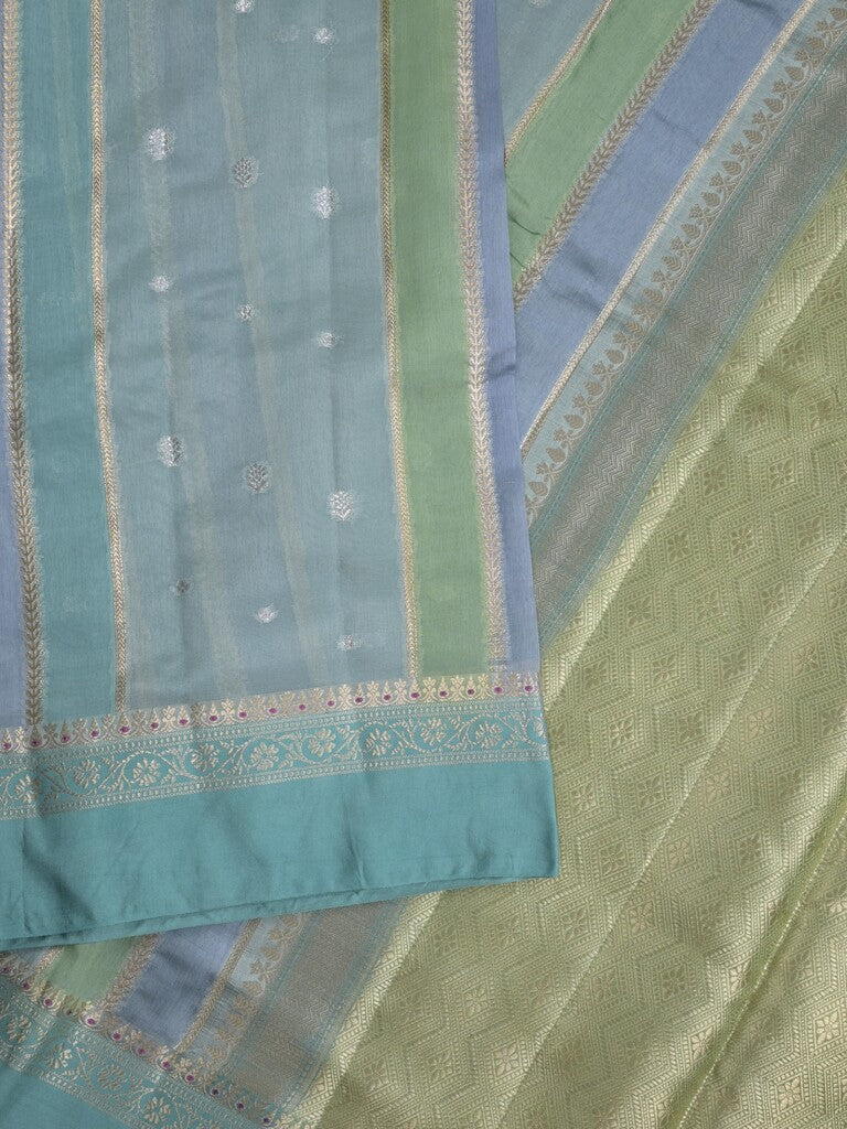 Raw mango fancy saree in light blue color with allover zari weaves and zari border with brocade pallu & blouse