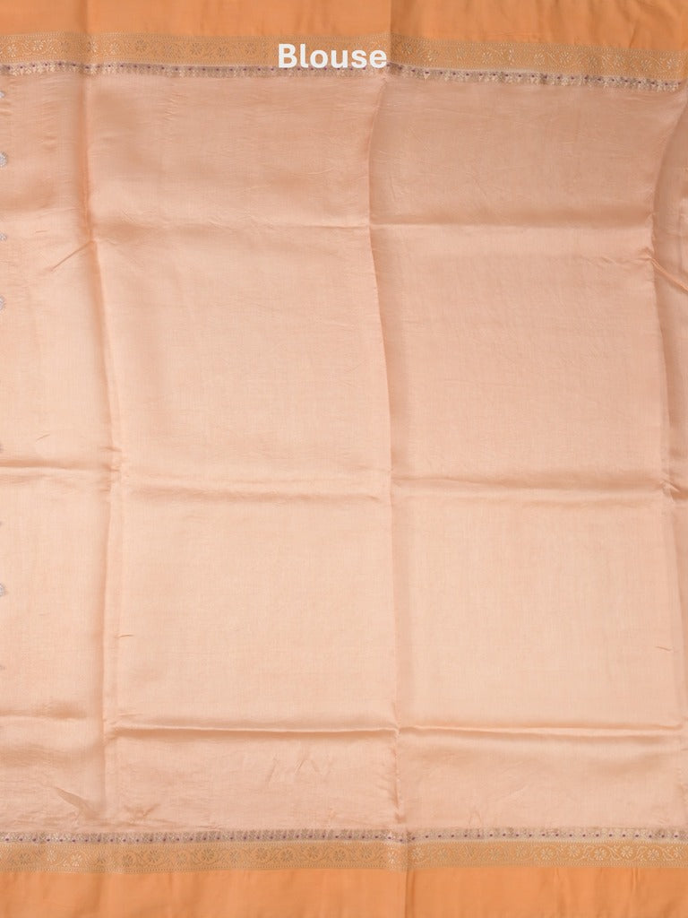 Raw mango fancy saree in peach color with allover zari weaves and zari border with brocade pallu & blouse