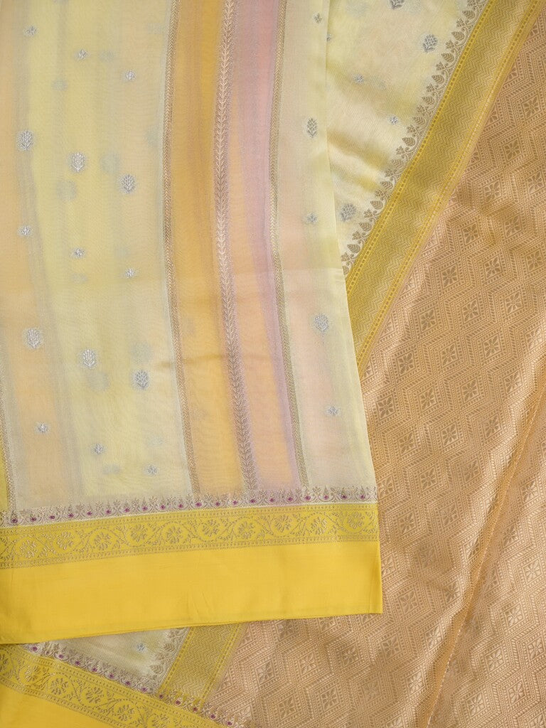 Raw mango fancy saree in cream color with allover zari weaves and zari border with brocade pallu & blouse