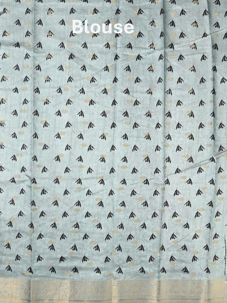 Dola silk fancy saree light blue color allover prints & zari border with printed pallu and printed blouse