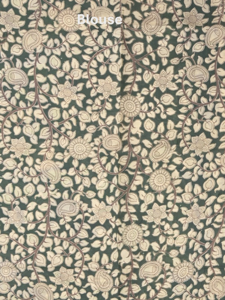 Kalamkari silk fancy saree in light cream color with contrast border & printed pallu and printed blouse