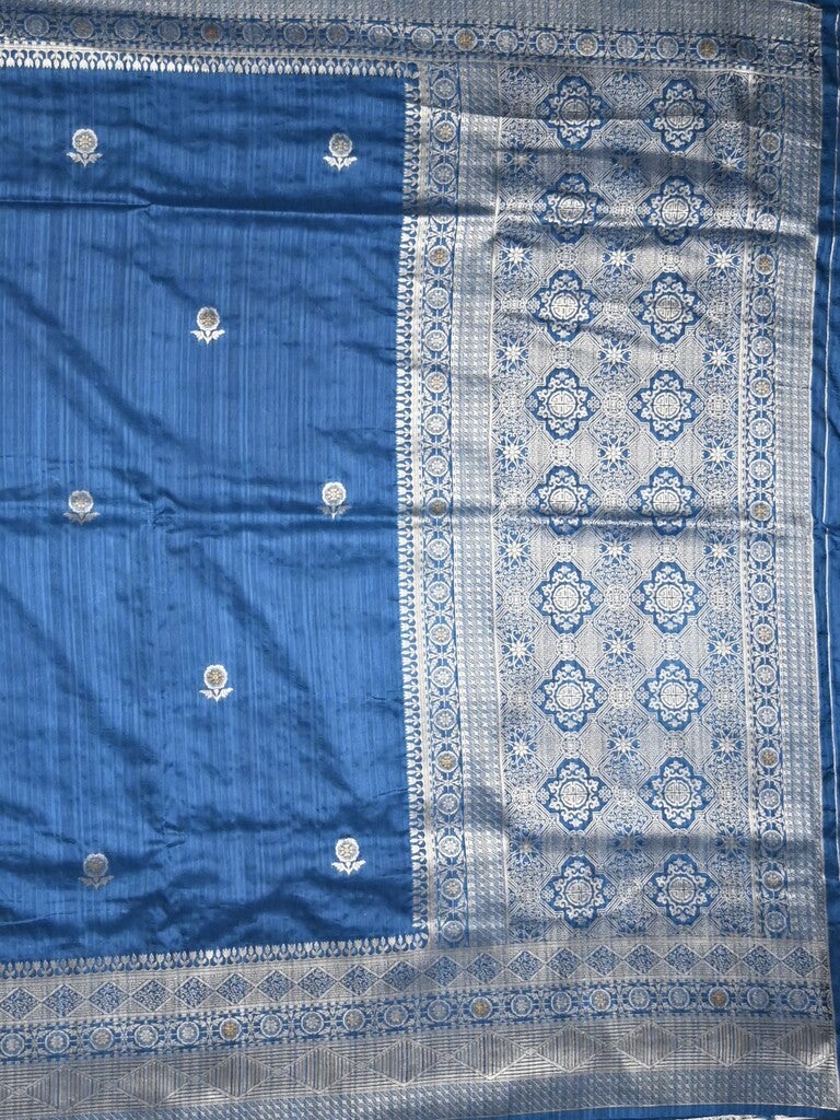 Jute sik fancy saree blue color allover zari motifs & zari border with rich pallu and attached blouse