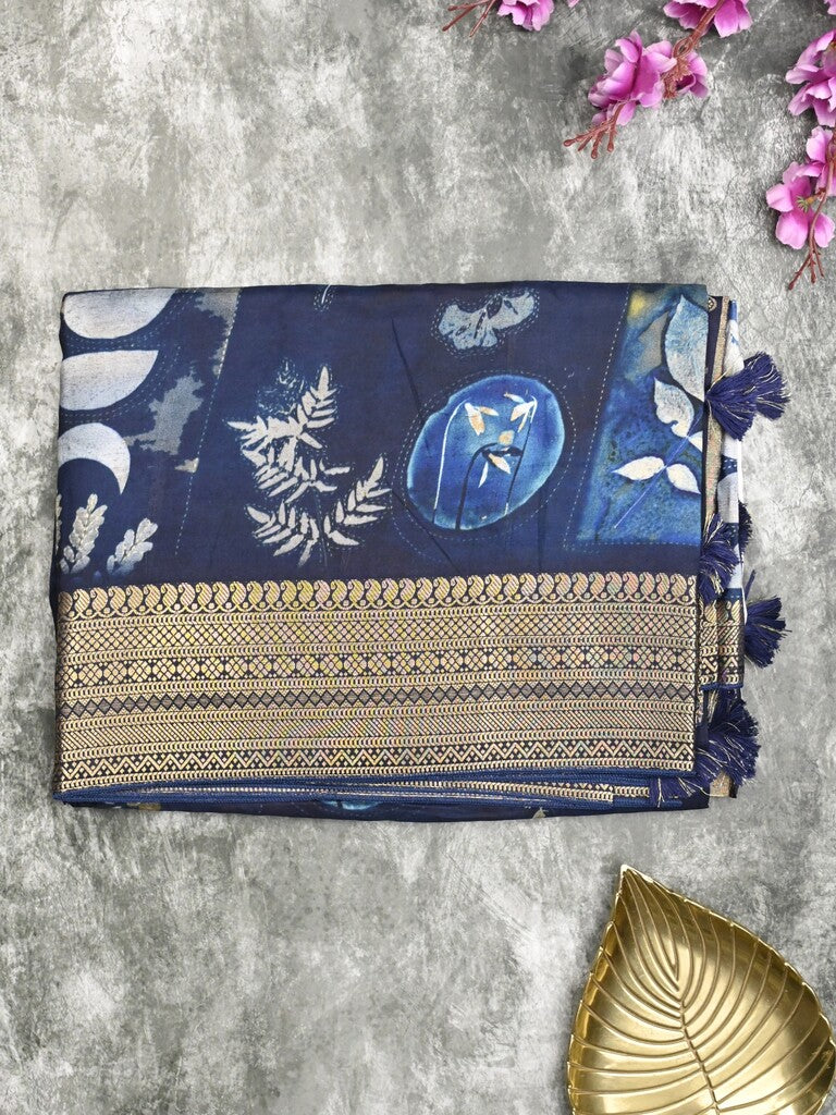 Dola silk fancy saree blue color allover prints & zari border with rich pallu and contrast plain blouse