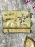 Dola silk fancy saree light olive green color allover prints & zari border with rich pallu and contrast plain blouse