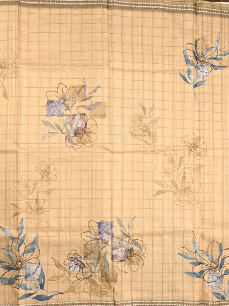 Tussar fancy saree cream color allover checks & prints with contrast pallu and printed blouse