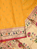 Banaras pattu saree golden yellow color allover zari motifs & paithani border with paithani pallu and contrast blouse