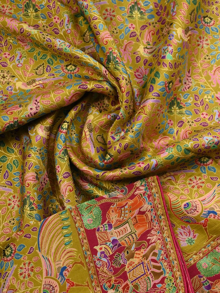 Dola silk fancy saree greenish yellow color allover weaves & weaving border with contrast pallu and attached blouse