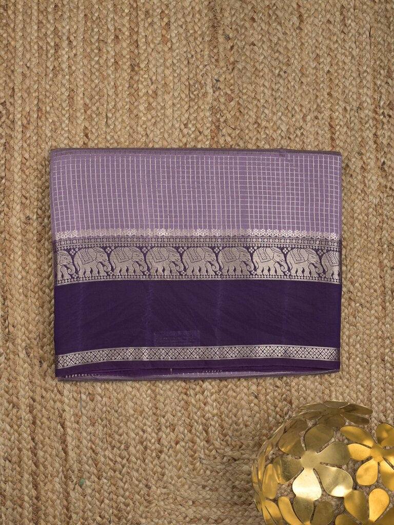 Dupion fancy saree allover checks & contrast border with zari pallu and plain blouse
