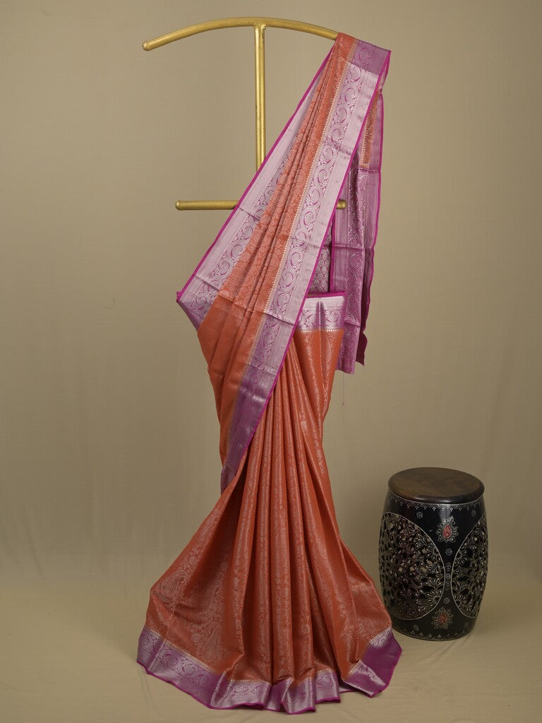 Georgette fancy saree orange color allover weaves & zari border with rich pallu and plain blouse