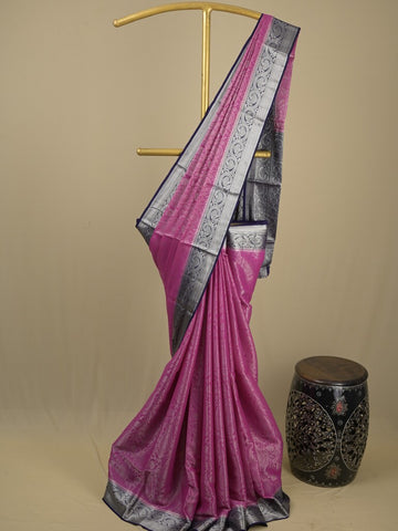 Georgette fancy saree purple color allover weaves & zari border with rich pallu and plain blouse