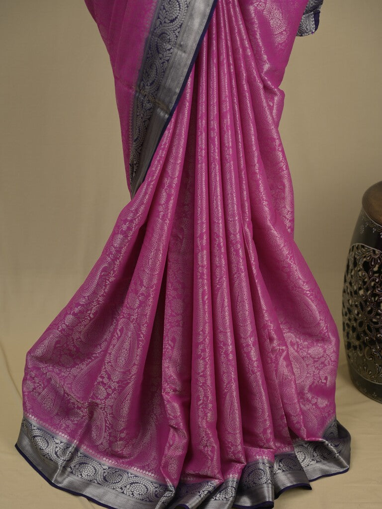 Georgette fancy saree purple color allover weaves & zari border with rich pallu and plain blouse