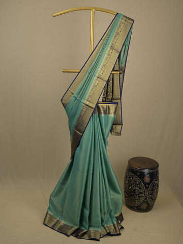 Georgette fancy saree lux green color allover weaves & zari border with rich pallu and plain blouse