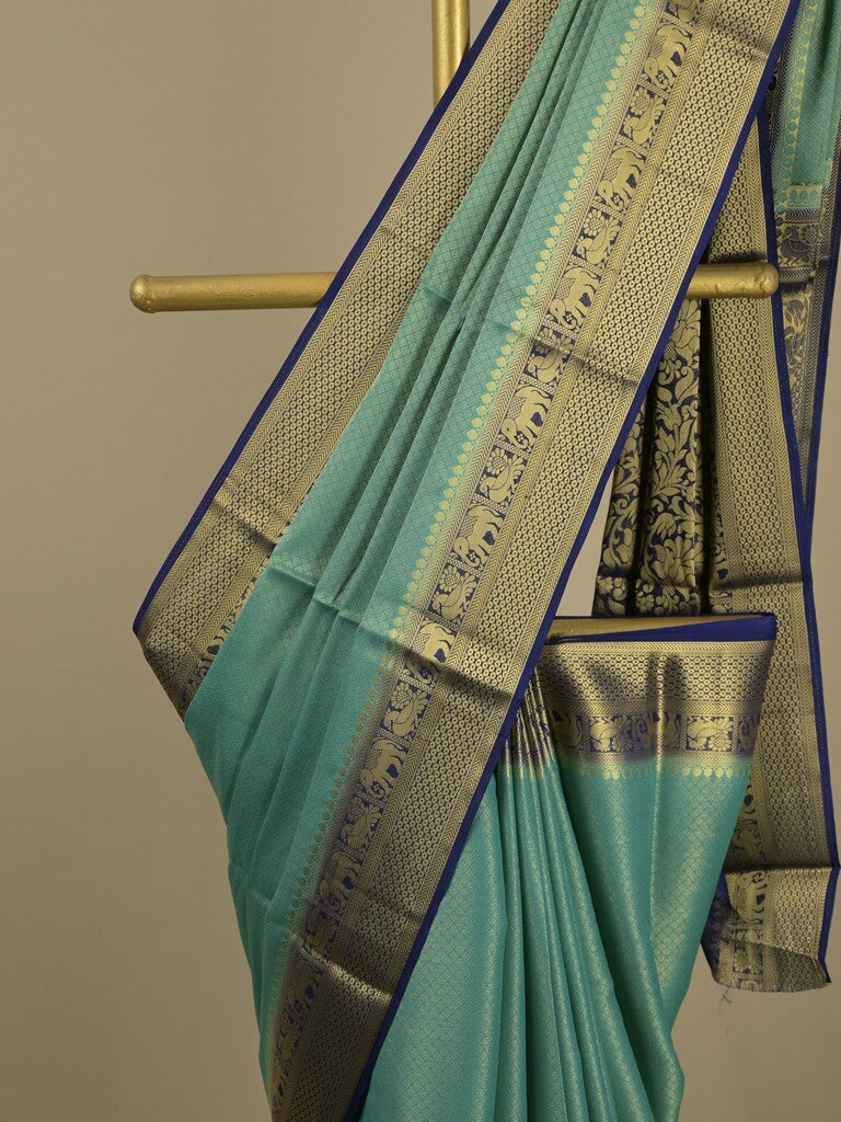 Georgette fancy saree lux green color allover weaves & zari border with rich pallu and plain blouse