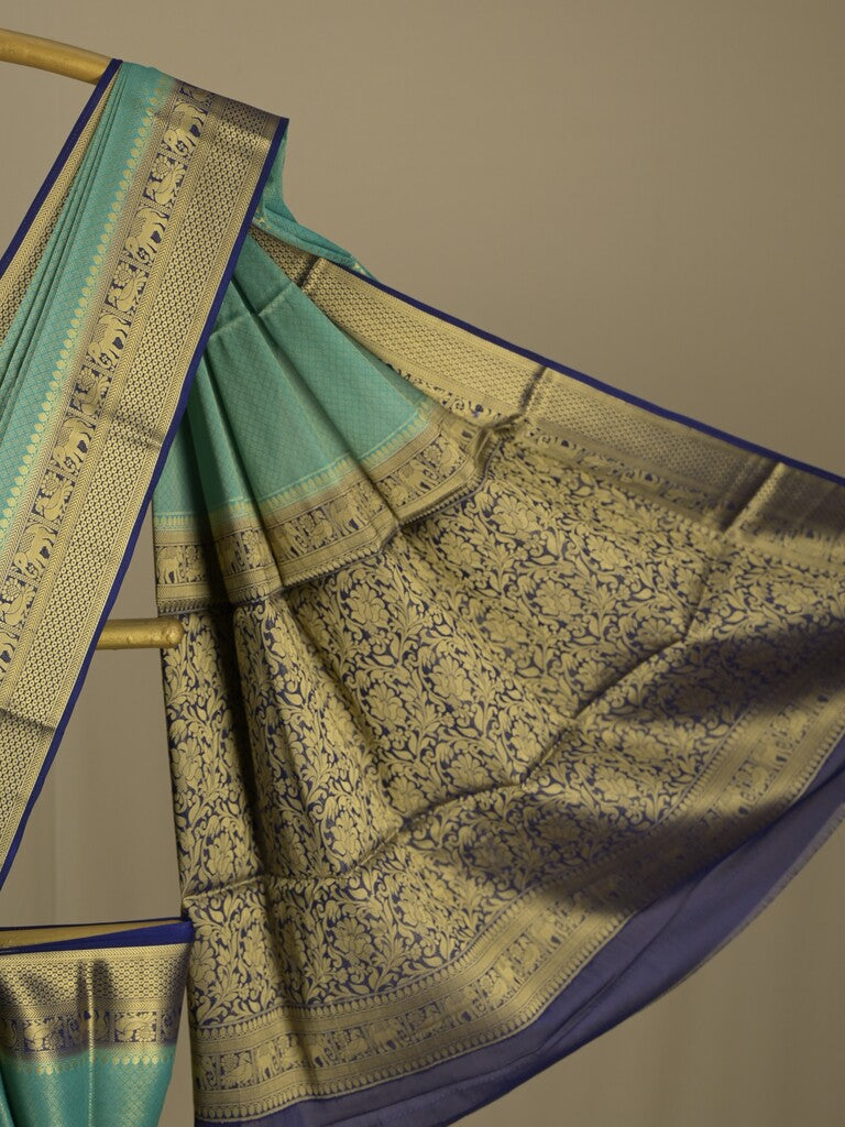 Georgette fancy saree lux green color allover weaves & zari border with rich pallu and plain blouse