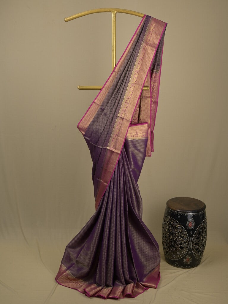 Georgette fancy saree violet color allover weaves & zari border with rich pallu and plain blouse