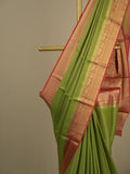 Georgette fancy saree parrot green color allover weaves & zari border with rich pallu and plain blouse