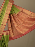 Georgette fancy saree parrot green color allover weaves & zari border with rich pallu and plain blouse