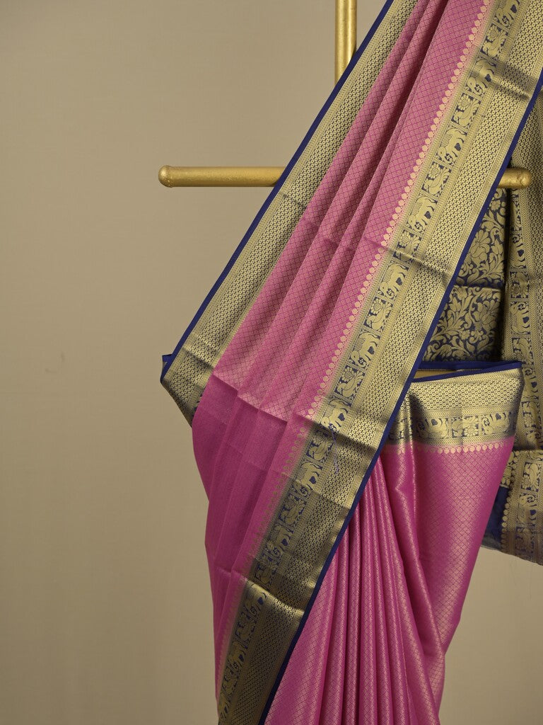 Georgette fancy saree purple color allover weaves & zari border with rich pallu and plain blouse
