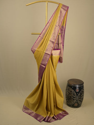 Georgette fancy saree golden yellow color allover weaves & zari border with rich pallu and plain blouse