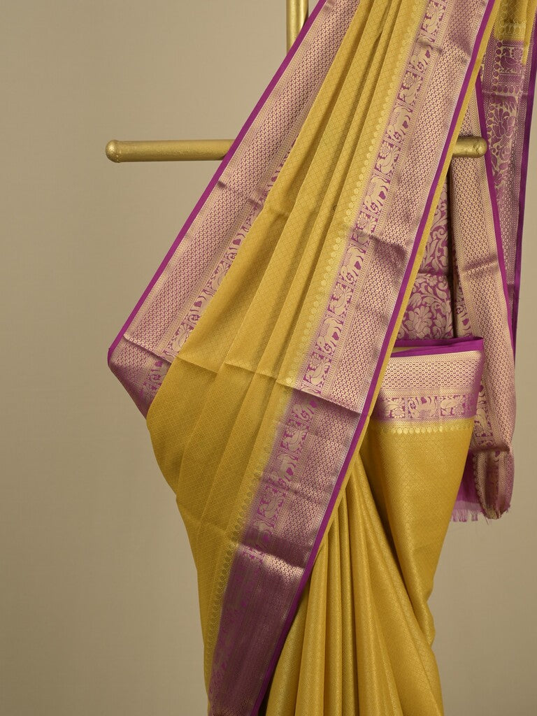 Georgette fancy saree golden yellow color allover weaves & zari border with rich pallu and plain blouse