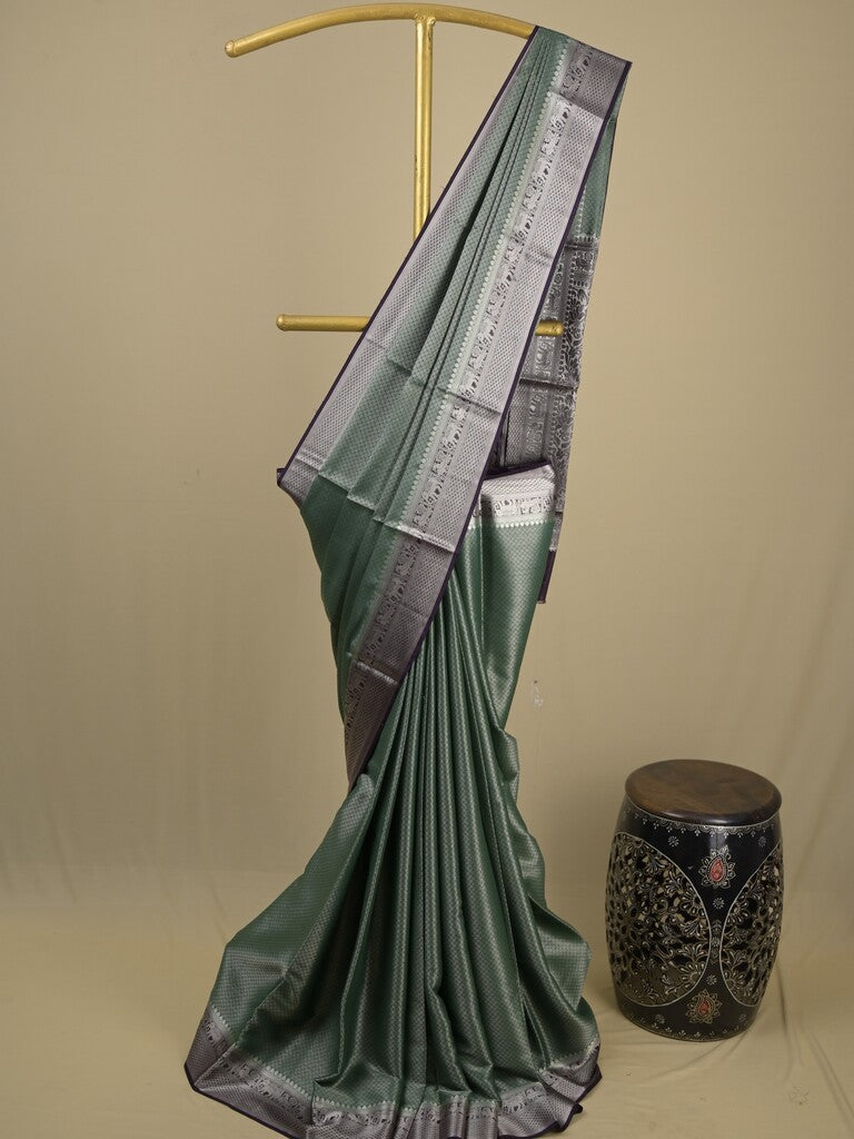 Georgette fancy saree pista green color allover weaves & zari border with rich pallu and plain blouse