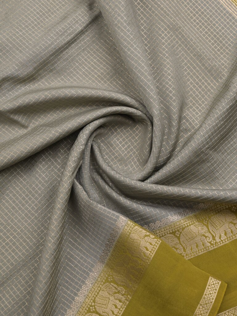 Dupion fancy saree allover checks & contrast border with zari pallu and plain blouse