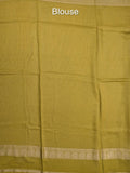 Dupion fancy saree allover checks & contrast border with zari pallu and plain blouse