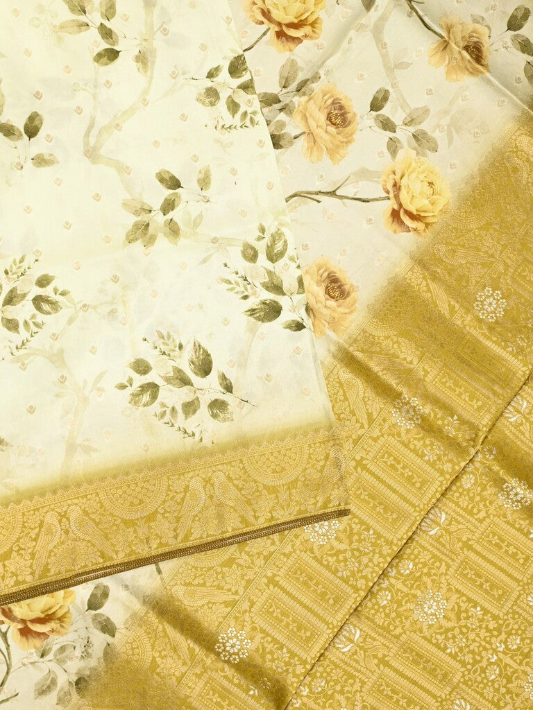 Dola silk fancy saree light cream color allover prints & zari border with rich pallu and contrast plain blouse