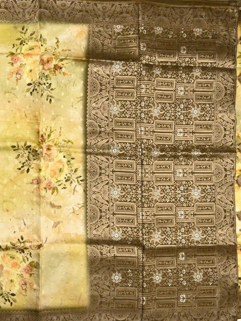 Dola silk fancy saree light yellow color allover prints & zari border with rich pallu and contrast plain blouse