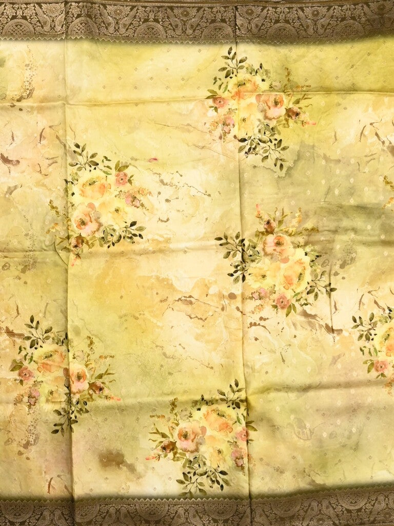 Dola silk fancy saree light yellow color allover prints & zari border with rich pallu and contrast plain blouse