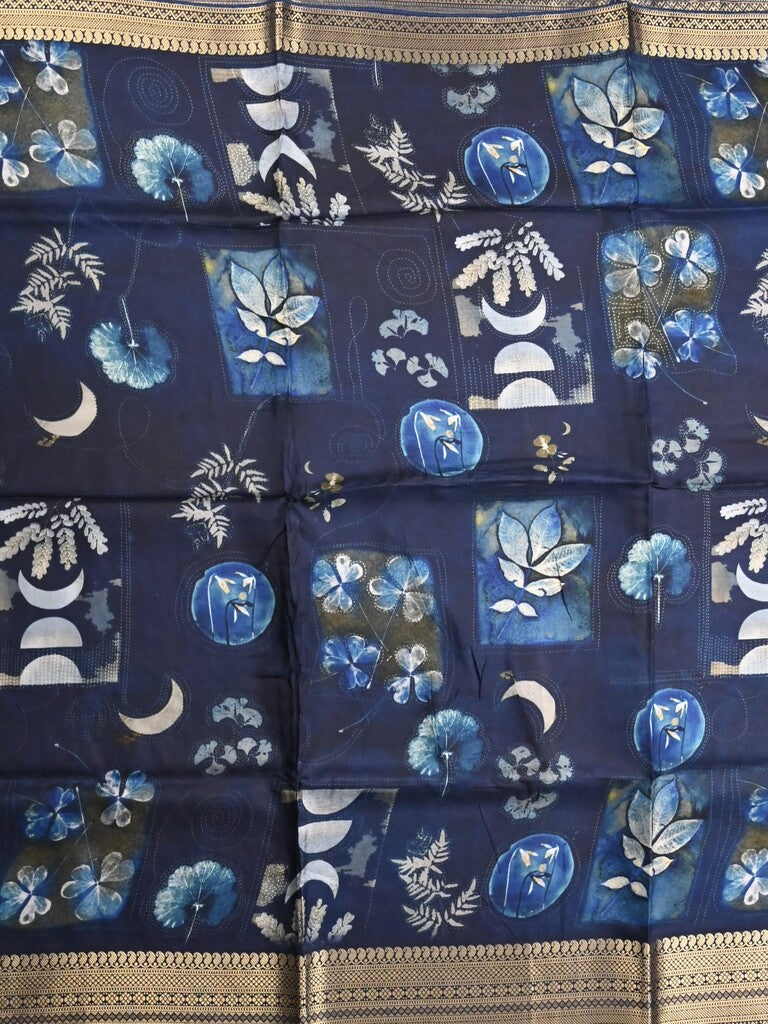 Dola silk fancy saree blue color allover prints & zari border with rich pallu and contrast plain blouse