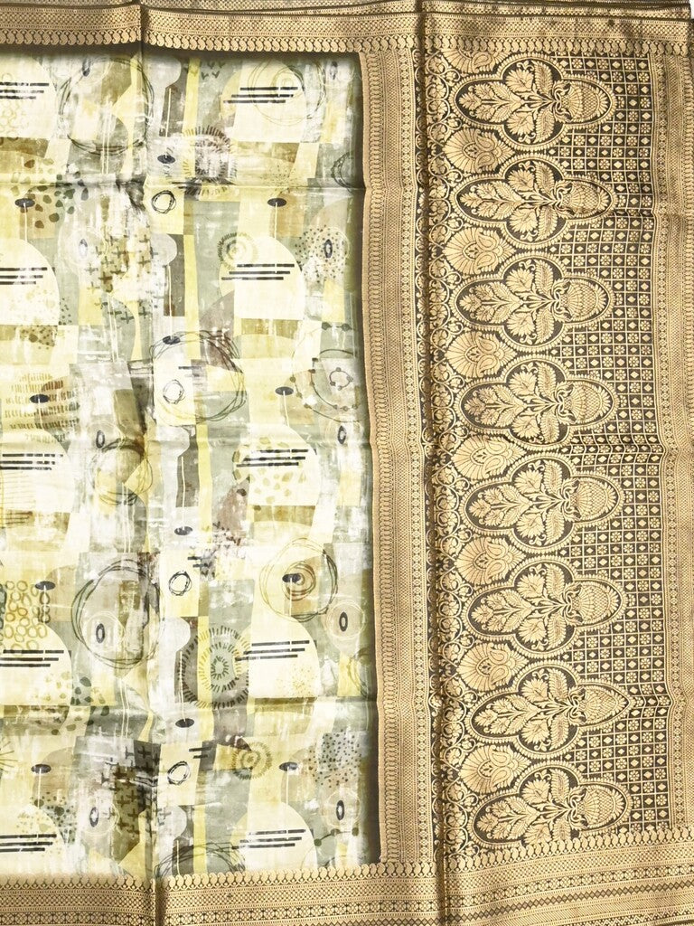 Dola silk fancy saree cream color allover prints & zari border with rich pallu and contrast plain blouse