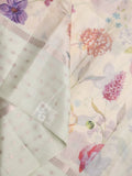 Kota fancy floral printed saree with contrast border and attached printed blouse