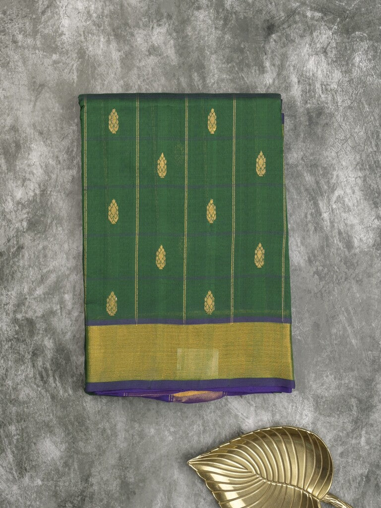 Uppada seiko pattu saree bottle green color allover checks, motifs & zari border with contrast pallu and plain blouse