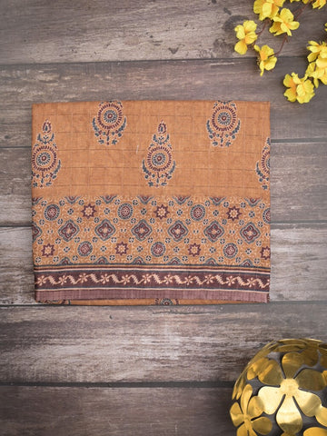 Tussar fancy saree light brown color allover prints & small kaddi border with short printed pallu and attached blouse
