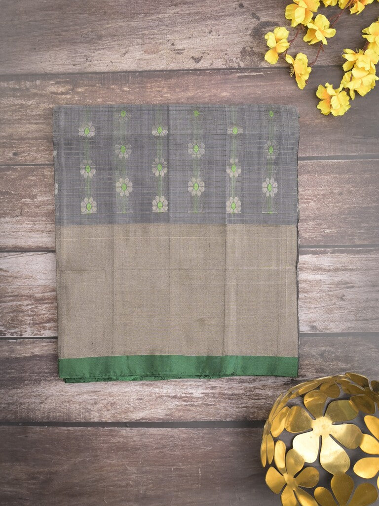 Uppada pattu saree grey color allover zari motifs & long kaddi border with rich pallu and contrast plain blouse