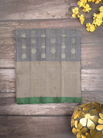 Uppada pattu saree grey color allover zari motifs & long kaddi border with rich pallu and contrast plain blouse