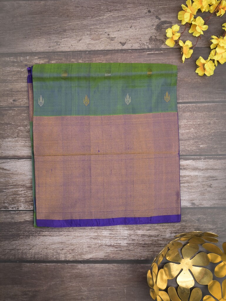 Uppada pattu saree peacock green color allover zari motifs & long kaddi border with rich pallu and contrast plain blouse