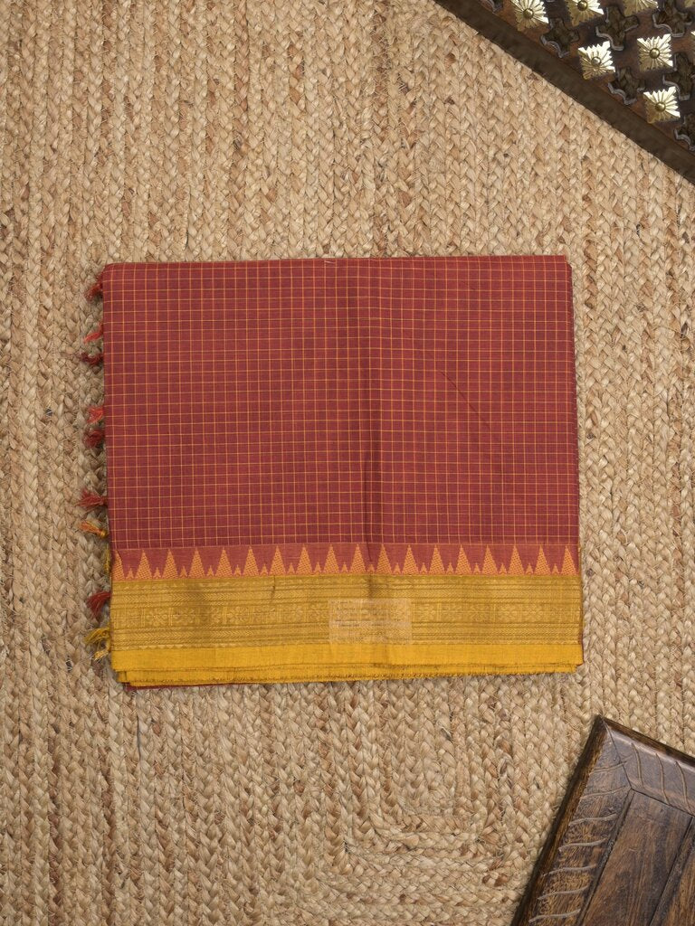 Kanchi cotton saree with zari border and attached self blouse