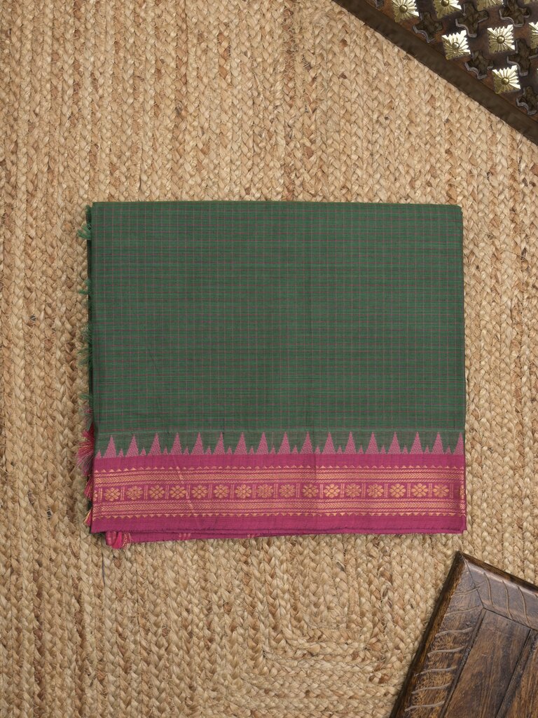 Kanchi cotton saree with zari border and attached self blouse