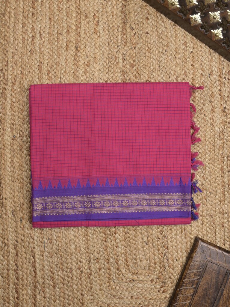 Kanchi cotton saree with zari border and attached self blouse