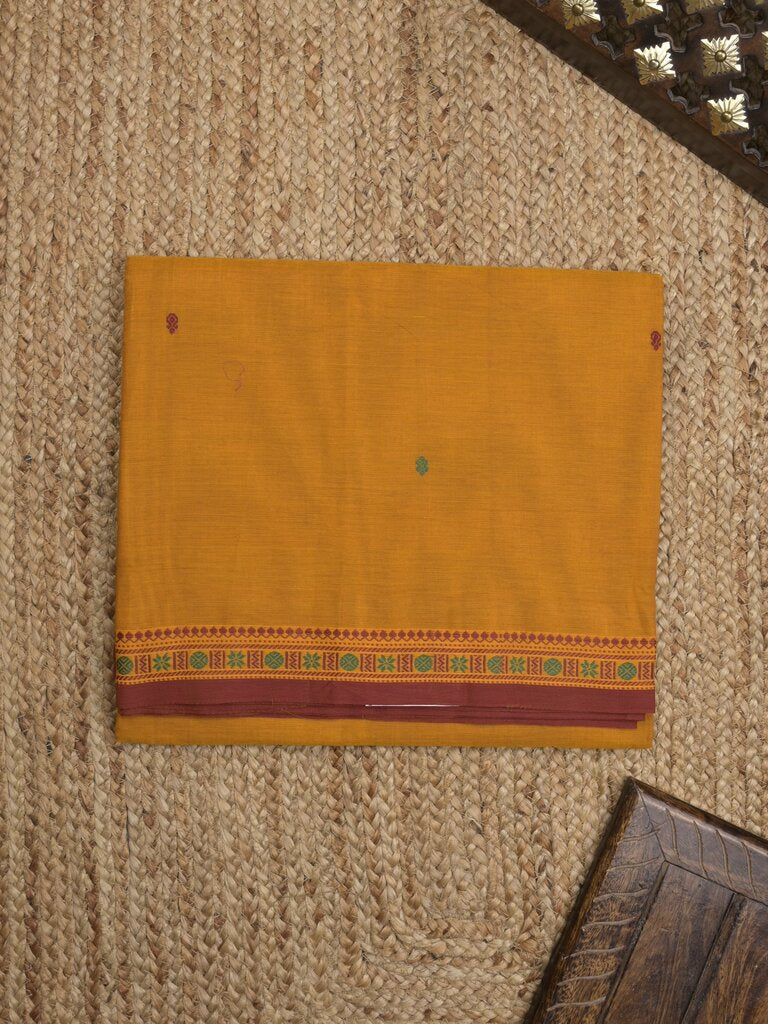Kanchi cotton saree allover motifs and zari border with attached self-blouse
